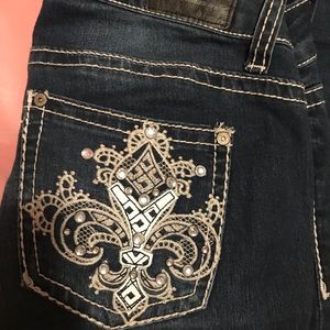 ripped bootcut jeans